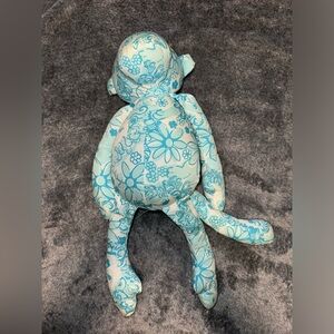Lilly Pulitzer lion print monkey.